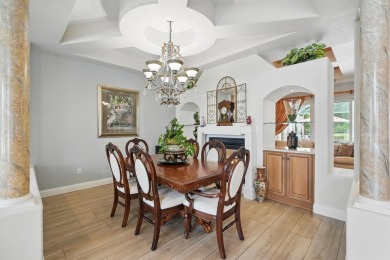 Welcome to timeless elegance and thoughtful design in this on The Grand Club Cypress Course in Florida - for sale on GolfHomes.com, golf home, golf lot