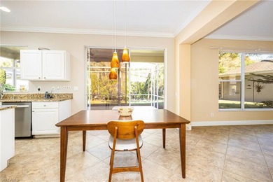 Discover exceptional value in this true four-bedroom residence on The Colony Golf and Country Club in Florida - for sale on GolfHomes.com, golf home, golf lot