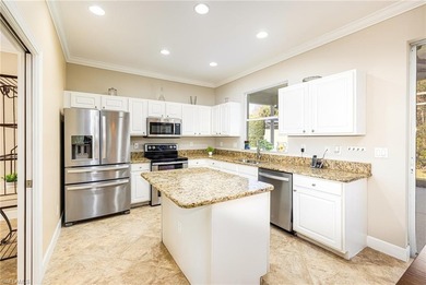 Discover exceptional value in this true four-bedroom residence on The Colony Golf and Country Club in Florida - for sale on GolfHomes.com, golf home, golf lot