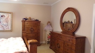 This charming three-bedroom Palm Harbor home offers an idyllic on Schalamar Creek Golf and Country Club in Florida - for sale on GolfHomes.com, golf home, golf lot