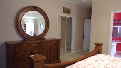 This charming three-bedroom Palm Harbor home offers an idyllic on Schalamar Creek Golf and Country Club in Florida - for sale on GolfHomes.com, golf home, golf lot