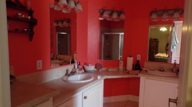 This charming three-bedroom Palm Harbor home offers an idyllic on Schalamar Creek Golf and Country Club in Florida - for sale on GolfHomes.com, golf home, golf lot