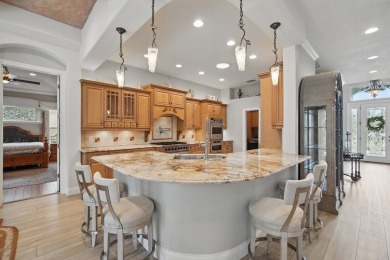 Welcome to timeless elegance and thoughtful design in this on The Grand Club Cypress Course in Florida - for sale on GolfHomes.com, golf home, golf lot