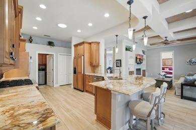 Welcome to timeless elegance and thoughtful design in this on The Grand Club Cypress Course in Florida - for sale on GolfHomes.com, golf home, golf lot