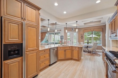Welcome to timeless elegance and thoughtful design in this on The Grand Club Cypress Course in Florida - for sale on GolfHomes.com, golf home, golf lot