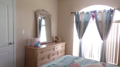This charming three-bedroom Palm Harbor home offers an idyllic on Schalamar Creek Golf and Country Club in Florida - for sale on GolfHomes.com, golf home, golf lot