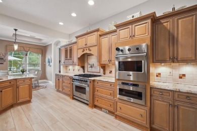 Welcome to timeless elegance and thoughtful design in this on The Grand Club Cypress Course in Florida - for sale on GolfHomes.com, golf home, golf lot