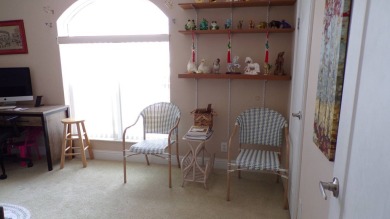 This charming three-bedroom Palm Harbor home offers an idyllic on Schalamar Creek Golf and Country Club in Florida - for sale on GolfHomes.com, golf home, golf lot