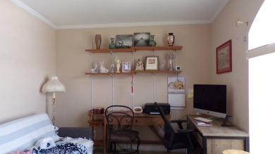 This charming three-bedroom Palm Harbor home offers an idyllic on Schalamar Creek Golf and Country Club in Florida - for sale on GolfHomes.com, golf home, golf lot
