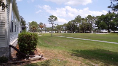 This charming three-bedroom Palm Harbor home offers an idyllic on Schalamar Creek Golf and Country Club in Florida - for sale on GolfHomes.com, golf home, golf lot