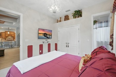 Welcome to timeless elegance and thoughtful design in this on The Grand Club Cypress Course in Florida - for sale on GolfHomes.com, golf home, golf lot