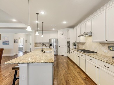 Enjoy views of greenspace and the golf course from this open on Frisco Lakes Golf Course in Texas - for sale on GolfHomes.com, golf home, golf lot