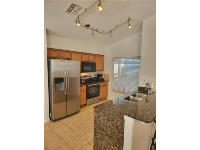 Welcome to this well-maintained 3-bedroom, 2-bathroom on Tampa Bay Golf and Country Club in Florida - for sale on GolfHomes.com, golf home, golf lot