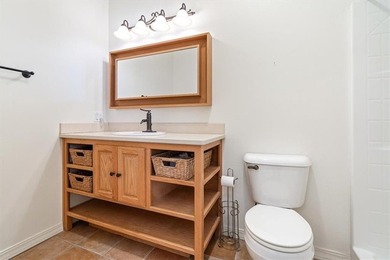 Quality lake area home with 2 large primary suites located on on Holiday Island Golf Course in Arkansas - for sale on GolfHomes.com, golf home, golf lot