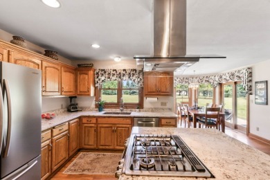 Beautifully maintained 5 BR, 2.5 BA Colonial on 1 plus acre on Western Lakes Golf Club in Wisconsin - for sale on GolfHomes.com, golf home, golf lot