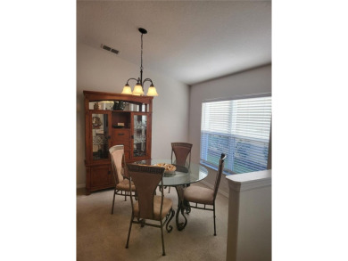 Welcome to this well-maintained 3-bedroom, 2-bathroom on Tampa Bay Golf and Country Club in Florida - for sale on GolfHomes.com, golf home, golf lot