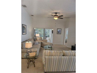 Welcome to this well-maintained 3-bedroom, 2-bathroom on Tampa Bay Golf and Country Club in Florida - for sale on GolfHomes.com, golf home, golf lot