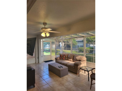 Welcome to this well-maintained 3-bedroom, 2-bathroom on Tampa Bay Golf and Country Club in Florida - for sale on GolfHomes.com, golf home, golf lot