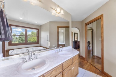 Beautifully maintained 5 BR, 2.5 BA Colonial on 1 plus acre on Western Lakes Golf Club in Wisconsin - for sale on GolfHomes.com, golf home, golf lot