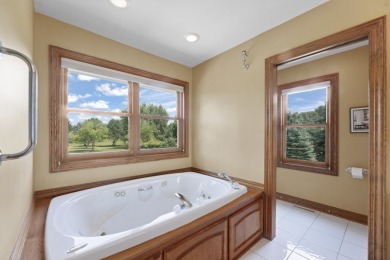 Beautifully maintained 5 BR, 2.5 BA Colonial on 1 plus acre on Western Lakes Golf Club in Wisconsin - for sale on GolfHomes.com, golf home, golf lot
