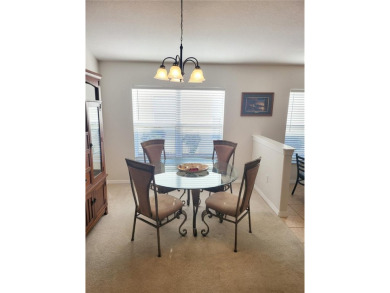 Welcome to this well-maintained 3-bedroom, 2-bathroom on Tampa Bay Golf and Country Club in Florida - for sale on GolfHomes.com, golf home, golf lot