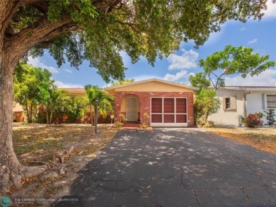 Discover the charm of this inviting single-family home. Located on Crystal Lake Country Club in Florida - for sale on GolfHomes.com, golf home, golf lot