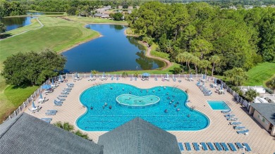 Welcome to this well-maintained 3-bedroom, 2-bathroom on Tampa Bay Golf and Country Club in Florida - for sale on GolfHomes.com, golf home, golf lot
