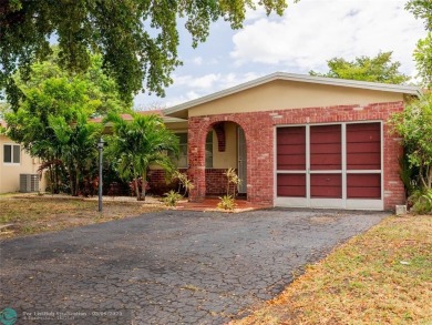 Discover the charm of this inviting single-family home. Located on Crystal Lake Country Club in Florida - for sale on GolfHomes.com, golf home, golf lot