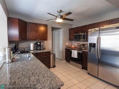Discover the charm of this inviting single-family home. Located on Crystal Lake Country Club in Florida - for sale on GolfHomes.com, golf home, golf lot