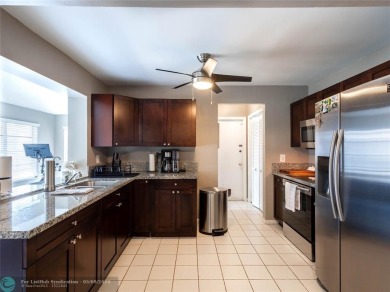 Discover the charm of this inviting single-family home. Located on Crystal Lake Country Club in Florida - for sale on GolfHomes.com, golf home, golf lot