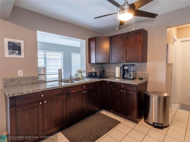 Discover the charm of this inviting single-family home. Located on Crystal Lake Country Club in Florida - for sale on GolfHomes.com, golf home, golf lot
