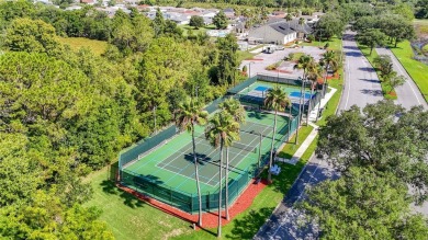 Welcome to this well-maintained 3-bedroom, 2-bathroom on Tampa Bay Golf and Country Club in Florida - for sale on GolfHomes.com, golf home, golf lot