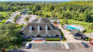 Welcome to this well-maintained 3-bedroom, 2-bathroom on Tampa Bay Golf and Country Club in Florida - for sale on GolfHomes.com, golf home, golf lot