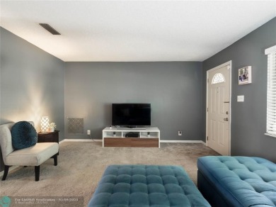 Discover the charm of this inviting single-family home. Located on Crystal Lake Country Club in Florida - for sale on GolfHomes.com, golf home, golf lot