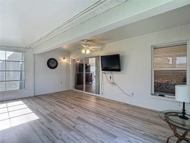 Welcome to this beautifully maintained 3-bedroom, 2-bathroom on Tampa Bay Golf and Country Club in Florida - for sale on GolfHomes.com, golf home, golf lot