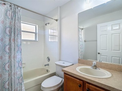 Welcome to this beautifully maintained 3-bedroom, 2-bathroom on Tampa Bay Golf and Country Club in Florida - for sale on GolfHomes.com, golf home, golf lot
