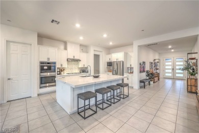 Experience unparalleled luxury and serenity in this contemporary on Reflection Bay Golf Club in Nevada - for sale on GolfHomes.com, golf home, golf lot