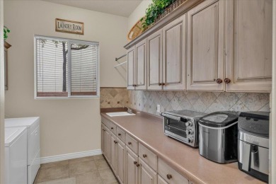 Meticulously maintained home located in the coveted Green on Green Spring Country Club in Utah - for sale on GolfHomes.com, golf home, golf lot