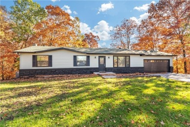 This beautifully remodeled 3 bedroom, 2 bathroom home at Holiday on Holiday Island Golf Course in Arkansas - for sale on GolfHomes.com, golf home, golf lot