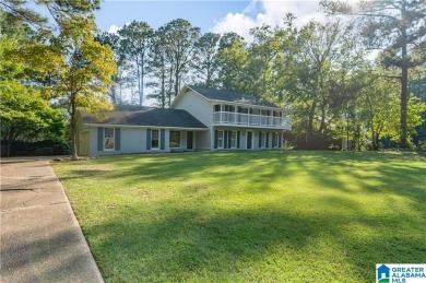 Discover this beautifully remodeled 4-bed, 3-bath all-brick home on Woodland Forrest Country Club in Alabama - for sale on GolfHomes.com, golf home, golf lot