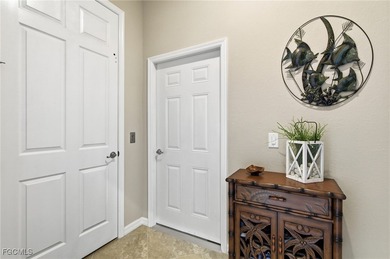 Located directly across from the Casella community pool and on Pelican Preserve Golf Club in Florida - for sale on GolfHomes.com, golf home, golf lot