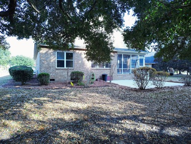 Cozy Two Bedroom, Two Bath Patio Home nestled at end of on Players Course At Wyboo Plantation in South Carolina - for sale on GolfHomes.com, golf home, golf lot