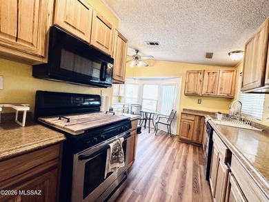 Step into this vibrant manufactured home just minutes from the on Mt. Graham Municipal Golf Course in Arizona - for sale on GolfHomes.com, golf home, golf lot