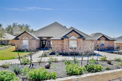 Located on the golf course in the gated community of Pecan on Pecan Plantation Country Club in Texas - for sale on GolfHomes.com, golf home, golf lot