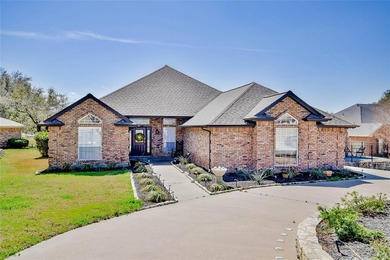 Located on the golf course in the gated community of Pecan on Pecan Plantation Country Club in Texas - for sale on GolfHomes.com, golf home, golf lot