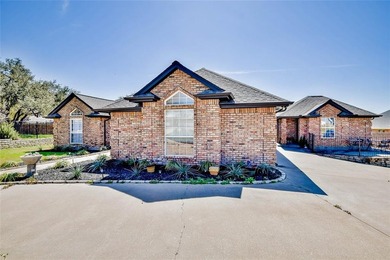 Located on the golf course in the gated community of Pecan on Pecan Plantation Country Club in Texas - for sale on GolfHomes.com, golf home, golf lot