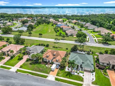 Charming 3-bedroom, 2-bathroom plus den home located in the on Harbor Hills Country Club in Florida - for sale on GolfHomes.com, golf home, golf lot