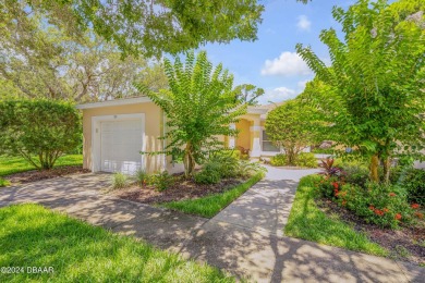 Welcome to easy, maintenance-free living in this charming on Turnbull Bay Golf Club in Florida - for sale on GolfHomes.com, golf home, golf lot