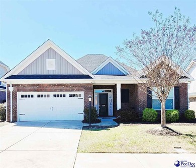 Experience peaceful luxury living at 309 Dormie Lane, located on The Members Club At Woodcreek in South Carolina - for sale on GolfHomes.com, golf home, golf lot