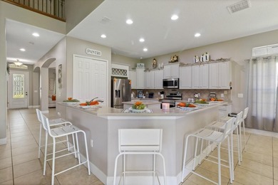 Welcome to this spacious and beautifully maintained home located on Kissimmee Bay Country Club in Florida - for sale on GolfHomes.com, golf home, golf lot